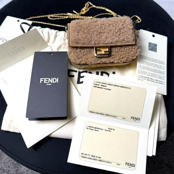 Fendi Handbags - Fendi Baguette Bag Tan and Gold Shearling Mini with original COA, tags, dust bag